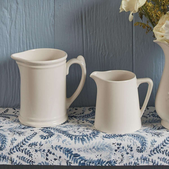 https://mammamiascloset.com/cdn/shop/products/farmhouse-style-milk-pitcher-220389_960x720.jpg?v=1701535978